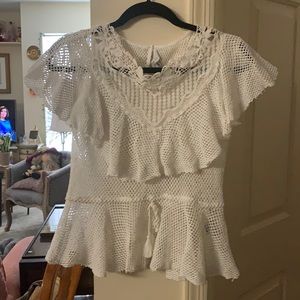 A laced top-peplum with under lining tank